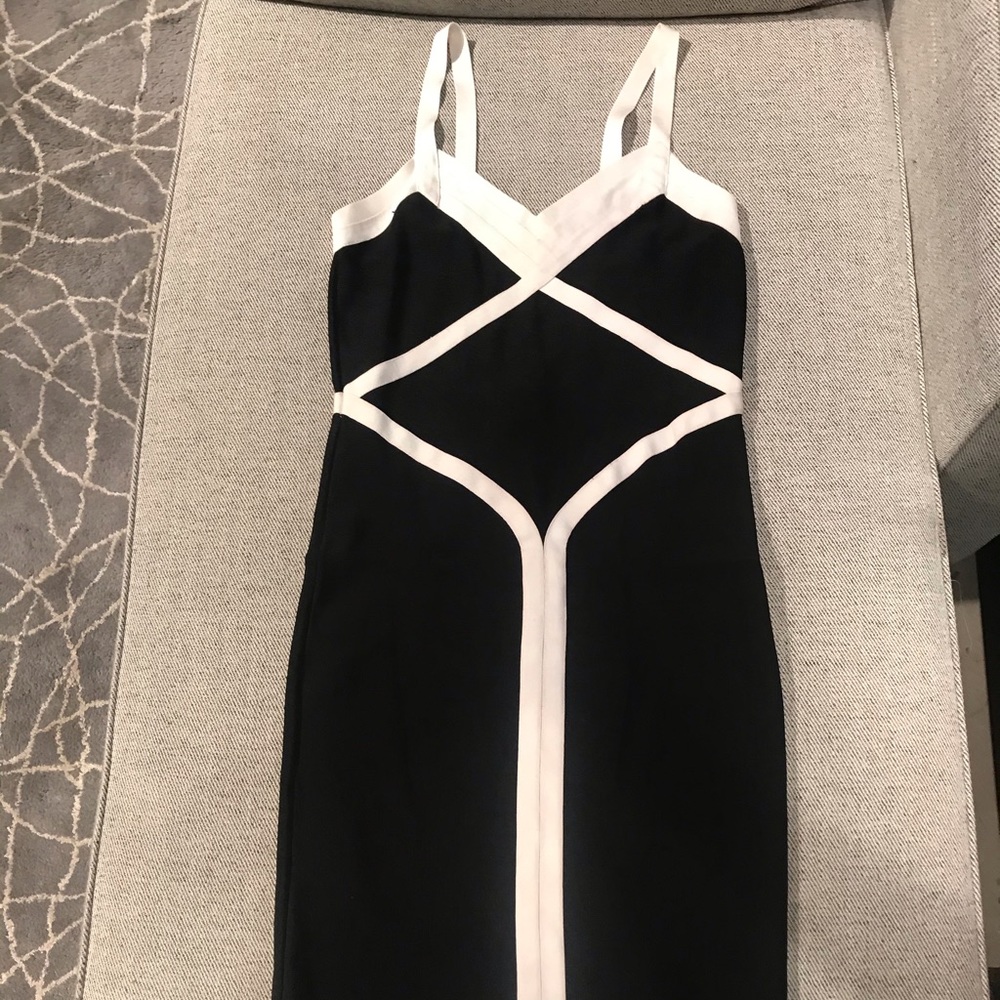 Bebe bandage dress. Black with creamy white detail